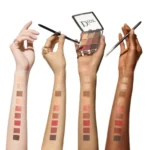 Three distinct shades of blush and powder from DIOR Backstage Eye Palette - 003 Amber Neutrals against a white backdrop.