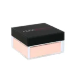 HUDA BEAUTY Easy Bake Loose Powder in a black box, labeled "Cupcake," for baking and setting makeup.