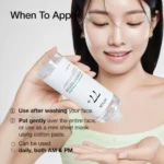 A woman showing Anua Heartleaf 77% Soothing Toner, emphasizing its pH 5.5 formula for calming and hydrating skin.